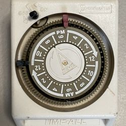 PLUG IN WALL TIMER