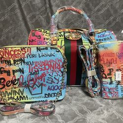Graffiti handbag with wristlet