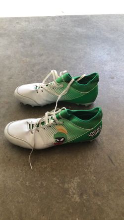 Used Phenom football cleats/ Looney Tunes style
