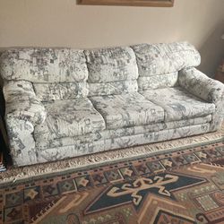 Large Sized Cream Colored Couch w/Pull out bed with headrest, Size: couch length 87” x 35” height x 37” wide, Mattress Size: 64” x 72” ) 