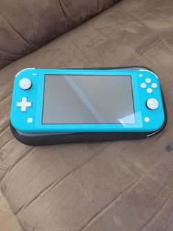 Nintendo Switch Lite + Case + SD Card