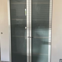 Tall Glass Bookcase – $180 OBO 