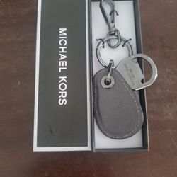 Michael kors bottle opener Keychain 
New
4$ Each