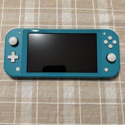 Nintendo Switch Lite - Turquoise with Mario Kart 8 Deluxe