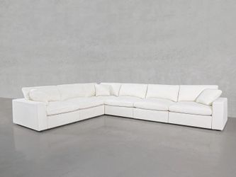 7th Avenue Couch 6 seat Modular Sectional. Comes with Brand New Natural White Covers!