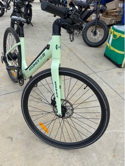 Step through e-bike 70 miles range 44lbs light weight