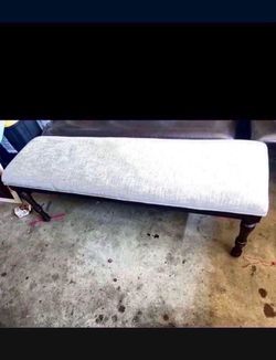 Bench Brand New  $130  54 wide 18 1/2 tall  fabric color gray  wood color brown .