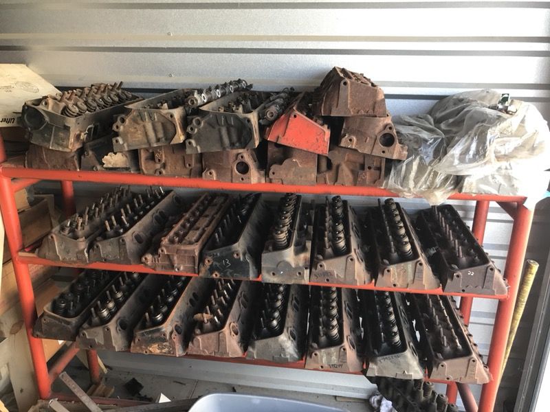 Various vintage Chevy cylinder heads