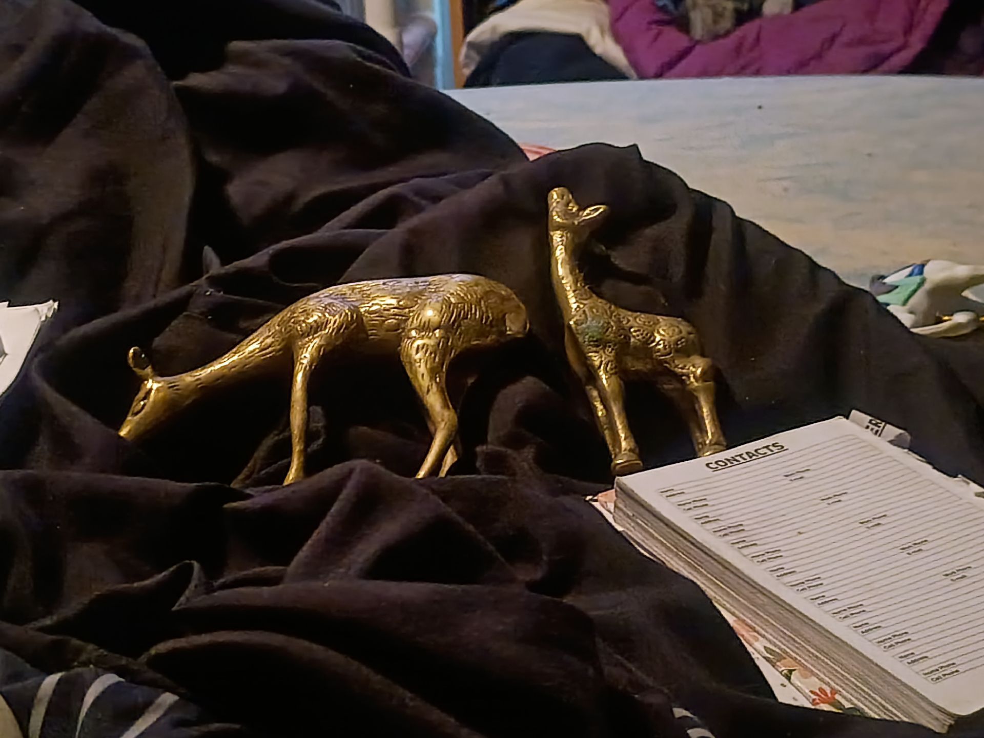 Brass deer and giraffe