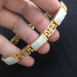 Gold color bracelet with resin inserts