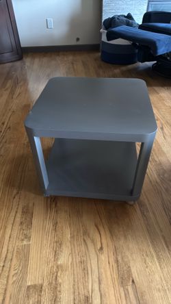 Small versatile grey table on casters  IKEA Tingby model