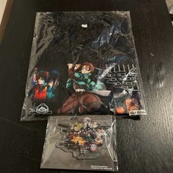 Kura Sushi x Demon Slayer shirt and acrylic stand