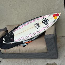 5'6" Al Merrick Rocket Nine Thruster Surfboard with Travel Case