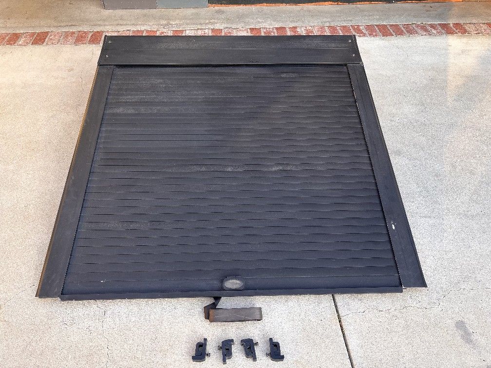 Retractible Tonneau Cover (hard) by Truck Covers USA.