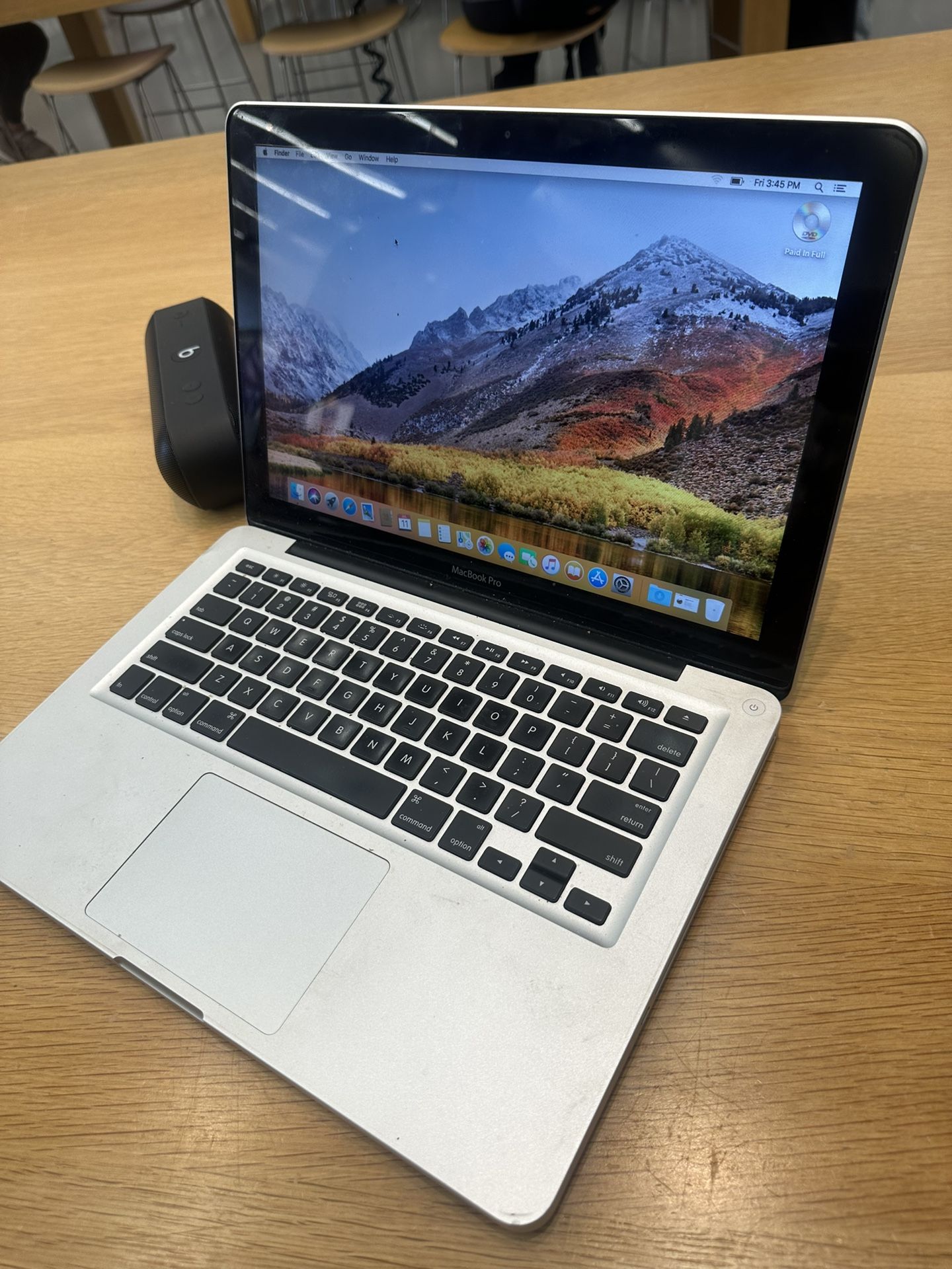 Apple Mac Book, 2 Pairs Of Apple Airpods, And Car Floor Jack