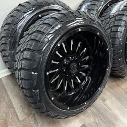 New 22x12 gloss black wheels wrapped in RBP 285/45r22 tires