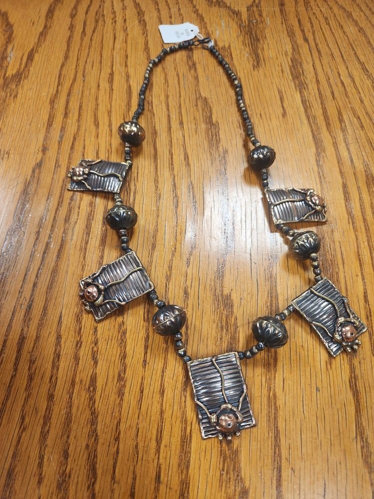 Vintage Brutalist Abstract Necklace
New condition. Very unique style