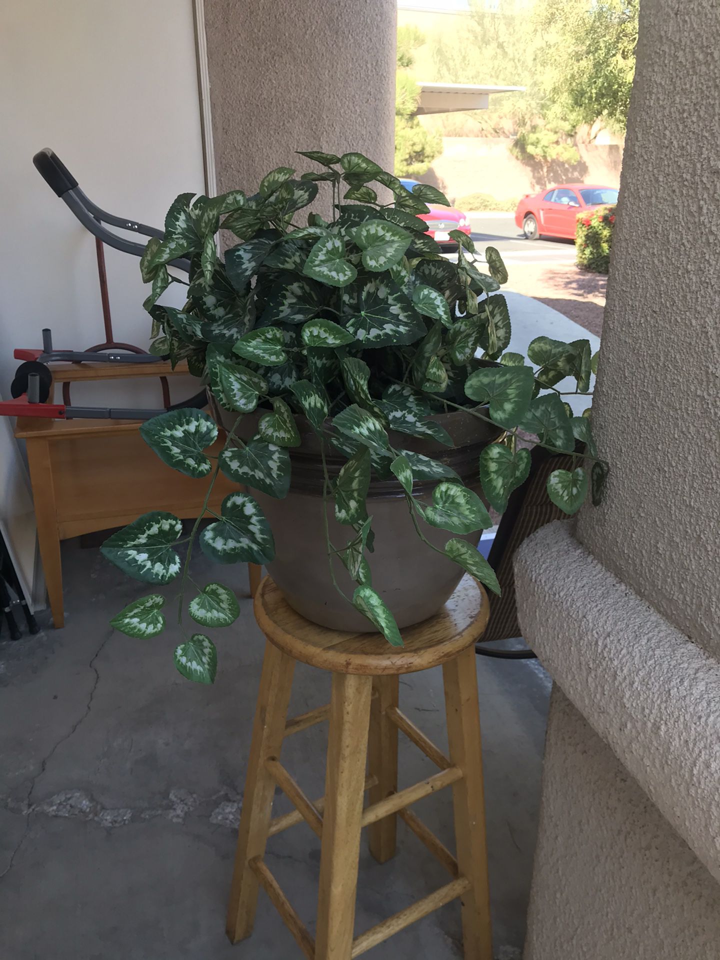 Large plastic pot and fake plant