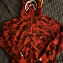 Red bape hoodie size medium but fits like a small 