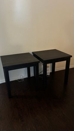 Two basically new side tables