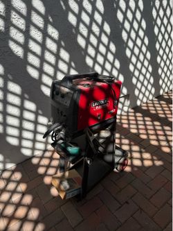 Used Lincoln Electric Pro Mig 140 wire-feed welder + 10lb of wire, with a cart, goggles, wire brush