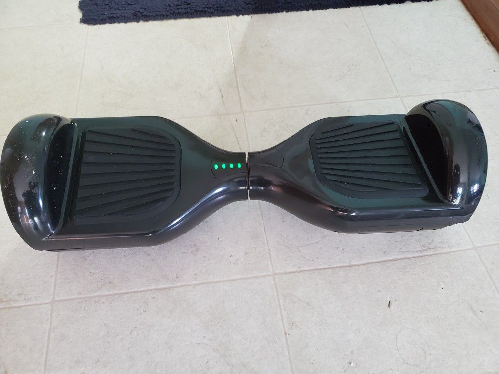Hoverboard with in-built bluetooth speaker