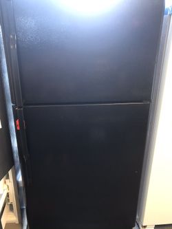 Used GE top and bottom fridge 21 cu ft. 1 year warranty