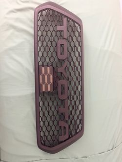 3rd gen Toyota Tacoma front grill with tss garnish cover