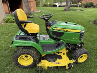 2021 JOHN DEERE X738 Signature Series Tractor and more. See full description