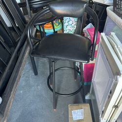 Three Black Swivel Bar Stools 