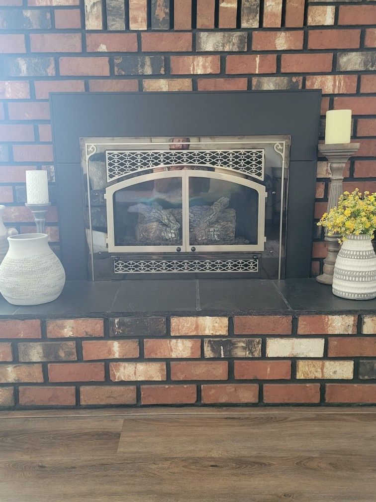 AVALON DVS PROPANE GAS FIREPLACE INSERT. VICTORIAN LACE FRONT. PURCHASED AT CAPITAL CITY STOVE IN OLYMPIA. 33 INCHES ACROSS. IN EXCELLENT CONDITION.