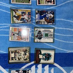 Ladainian Tomlinson jersey card, Tedd Ginn Jr jersey card, Leon Washington jersey card