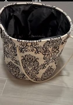 Beautiful laundry basket white and Black  17 wide 19. Long