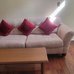 Comfortable beige sofa and love seat set