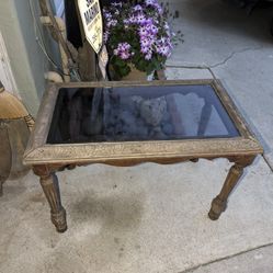 Antique glass top coffee table