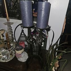 2 WROUGHT IRON CANDLE STICK HOLDERS WITH CANDLES