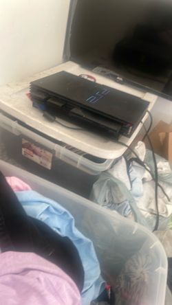 Used ps2 really dusty but works  great if you want pictures of the games please let me know