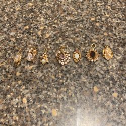 7 Gold Layered Pendants 