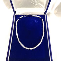 Brand new 20 inch pearl, strand necklace with silver clasp