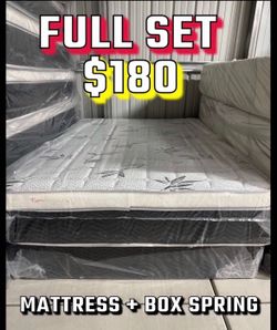 Full size pillow top mattress with box spring