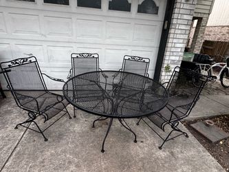 Wrought iron patio table & spring rocker chairs