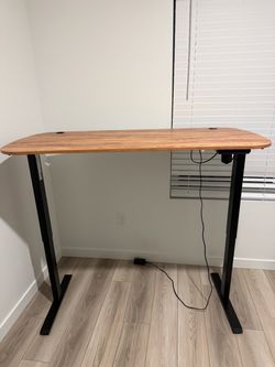 Amazing Condition Like New Electric Adjustable Curved Standing Desk (Wood Grain/Black Legs)