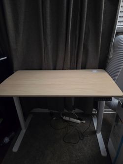 Rising desk