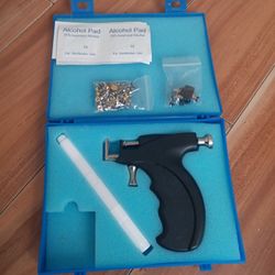 Ear Priecing Gun Everything Included .Never Been Used.