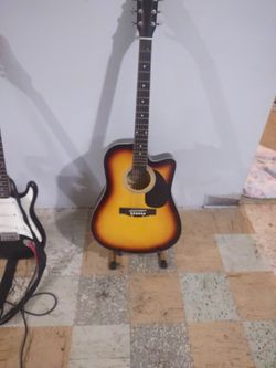 Huntington Acoustic Guitar With Capo