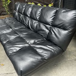 Foldable Black couch bed with stainless steel legs