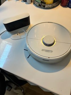 Roborock Robot Vacuum and Charging Dock