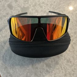 NEW OAKLEY SUTRO WITH PRIZM RED LENS