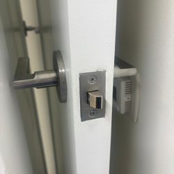 Two solid wood doors with hardware 35 “ x 89“. $100 each