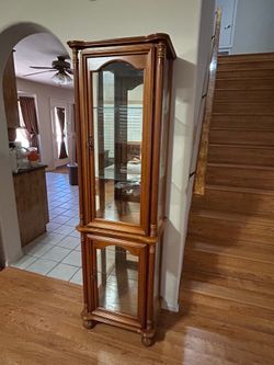 Vintage curio cabinet with lights